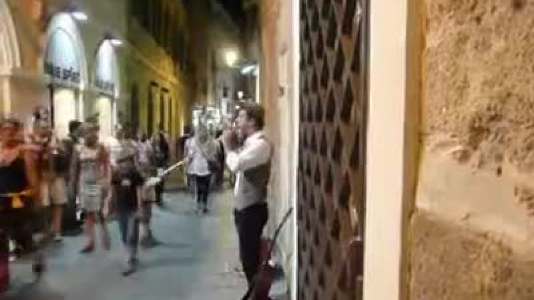 ⁣Owner Records Two Flutes Sanctimoniously Busking Alghero In The Northwest Coast Of Sardinia Italy