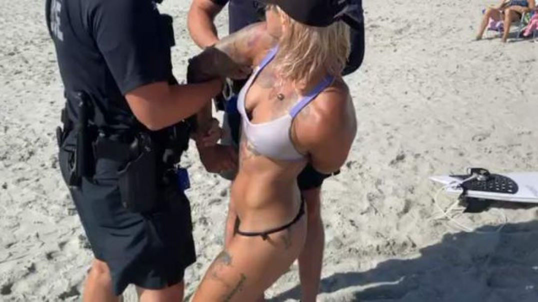 COPS HANDCUFF AND DETAIN WOMAN FOR WEARING A THONG ON THE BEACH❗