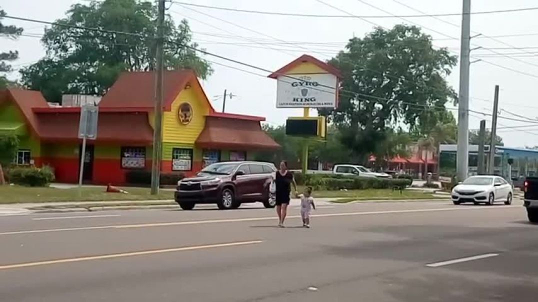 RAW latin child abductor abuser dragging children through five lanes of busy traffic never enforced!