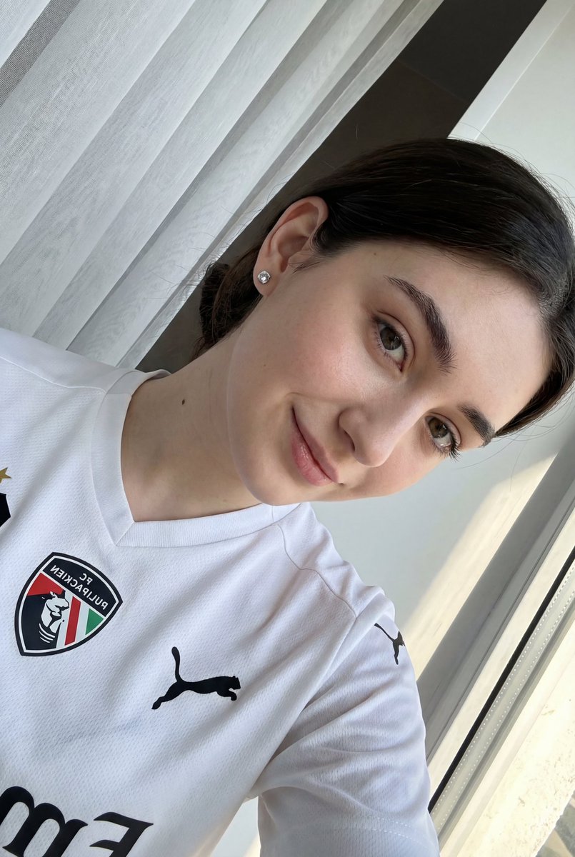 AI Prompt for Casual Portrait of Young Woman in Sports Jersey