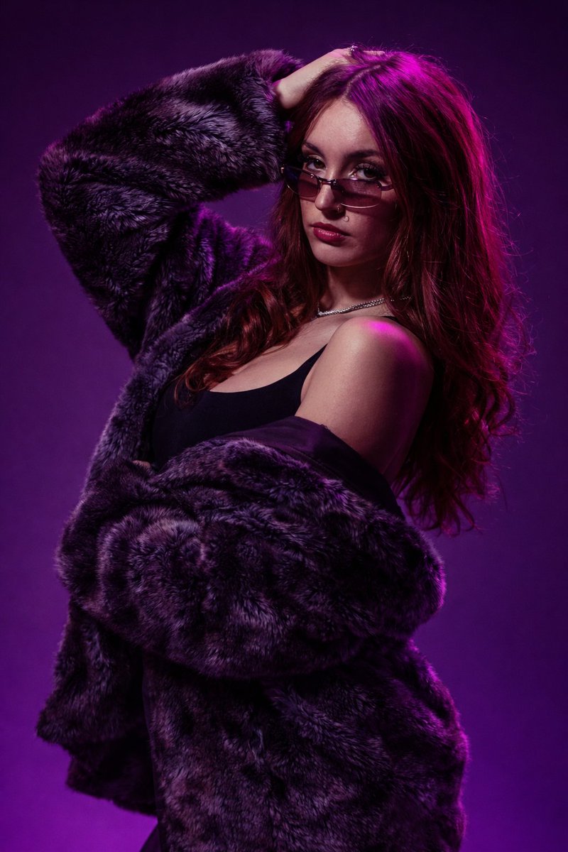 Magenta Haired Woman in Faux Fur Sunglasses Portrait