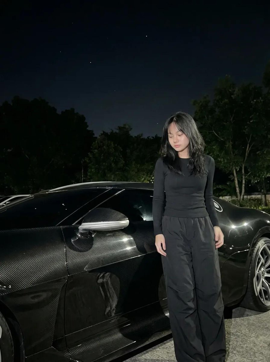 AI Prompt for Cinematic Luxury Car Photography with Female Model