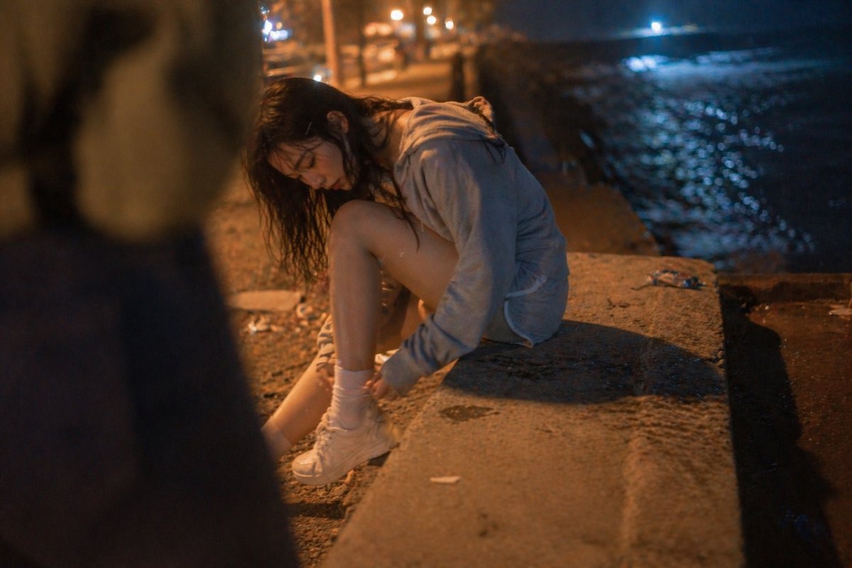 AI Prompt for Cinematic Night Portrait of Woman at Beach