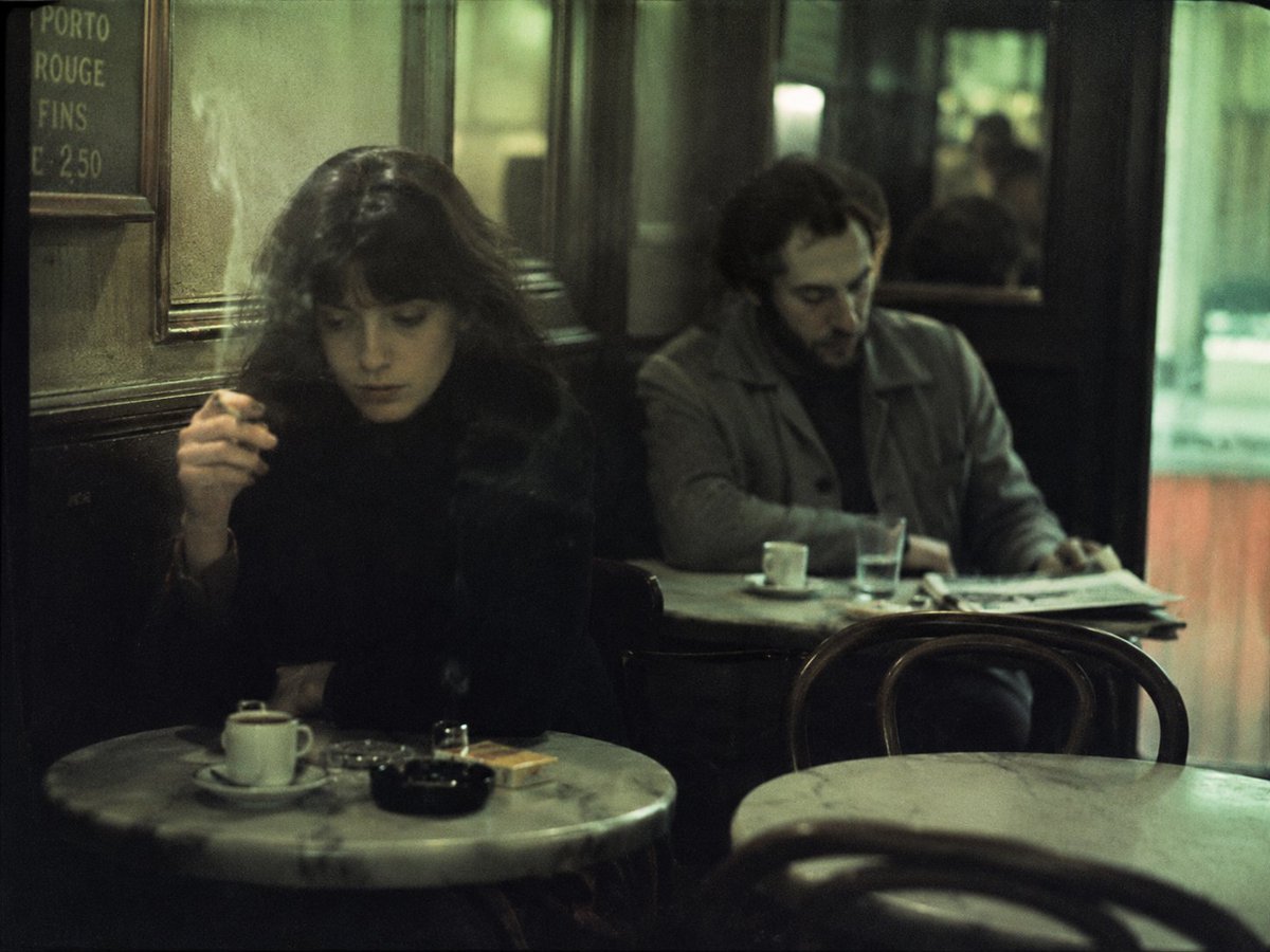 AI Prompt for Cinematic Parisian Café Scene with Moody Lighting