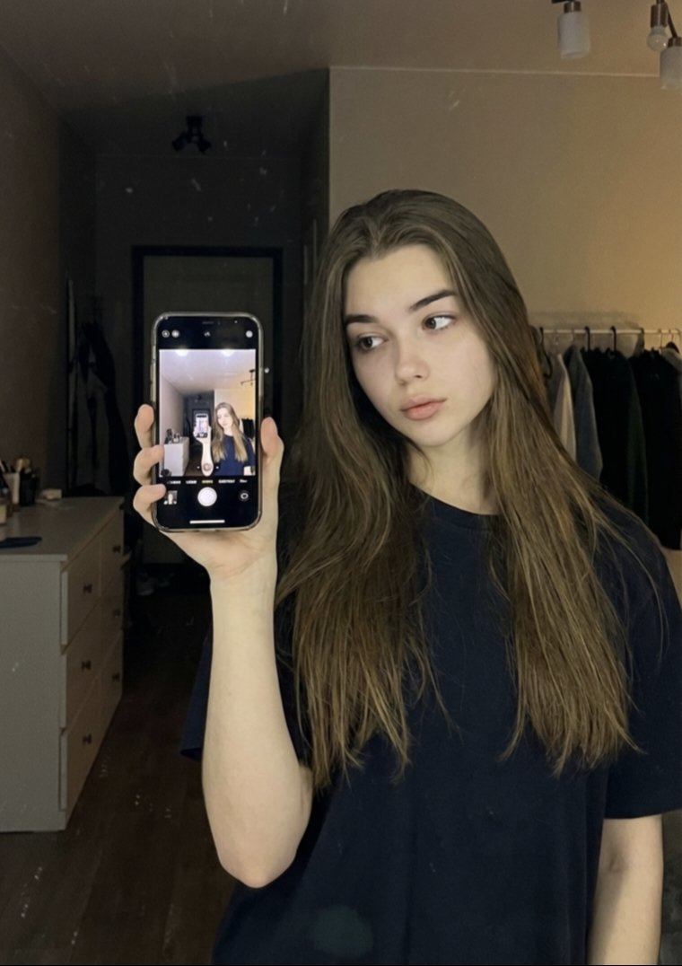 AI Prompt for Natural Lifestyle Selfie Portrait with Soft Warm Indoor Lighting