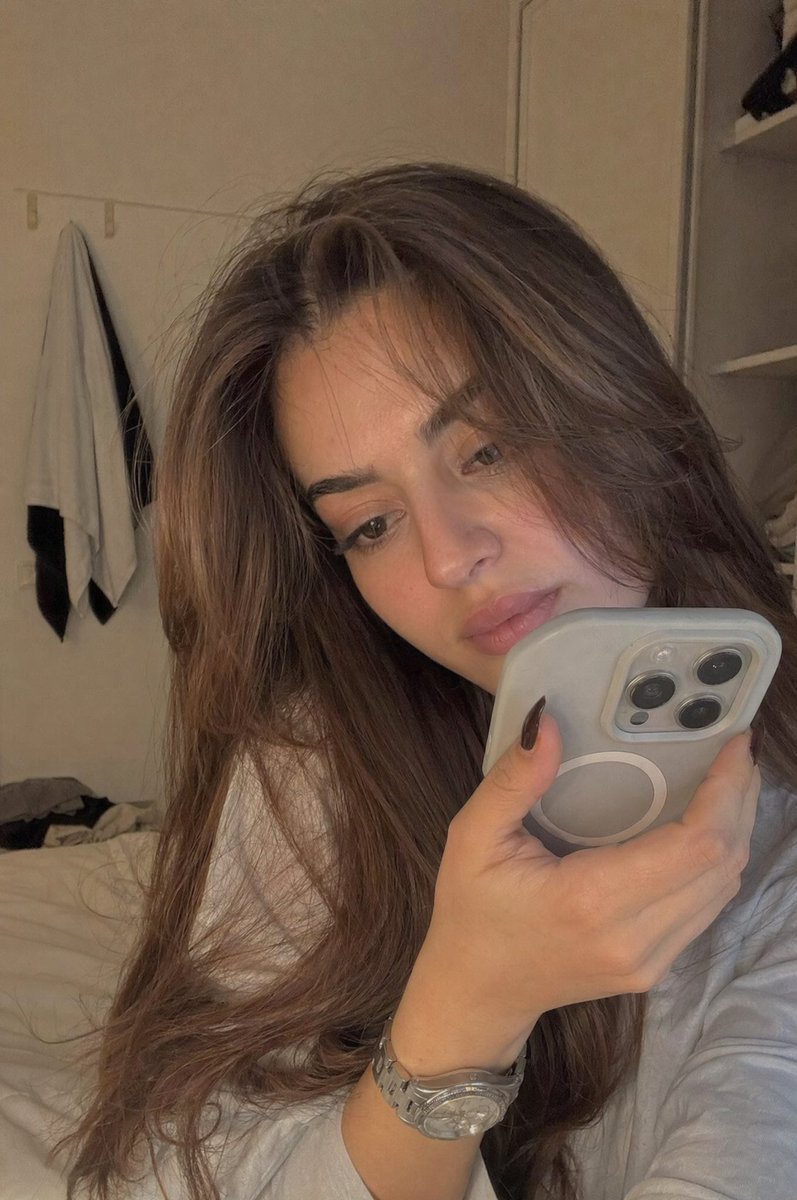 AI Prompt for Realistic Bedroom Phone Recording Style Portrait Photography