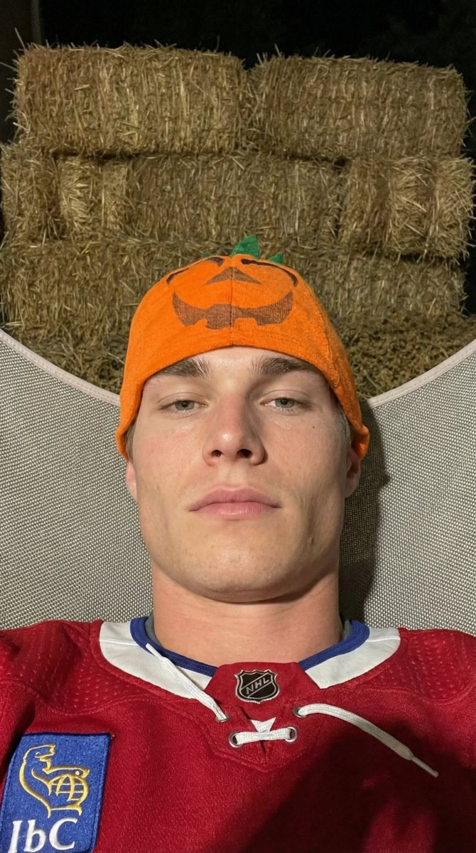 AI Prompt for Smartphone Portrait of Hockey Fan Wearing Orange Beanie and Montreal Canadiens Jersey