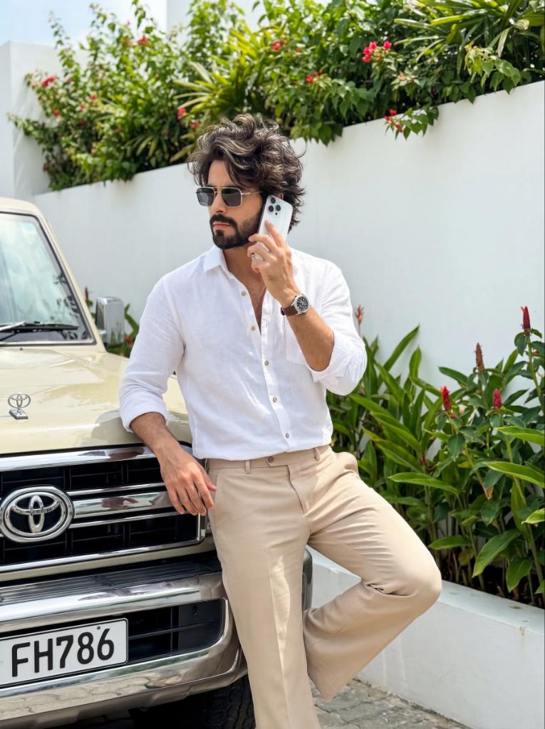 AI Prompt for Ultrarealistic Stylish Boy Leaning on a Land Cruiser for Social Media Post