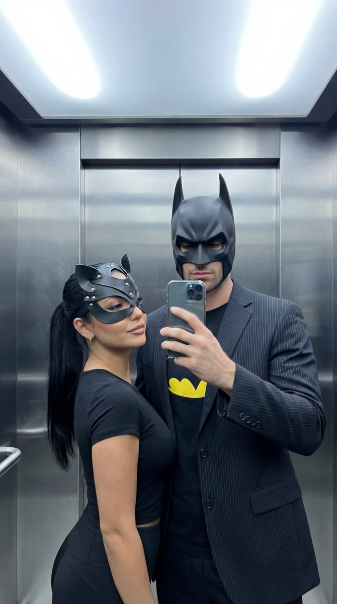 AI Prompt: Photorealistic Batman Catwoman Elevator Selfie