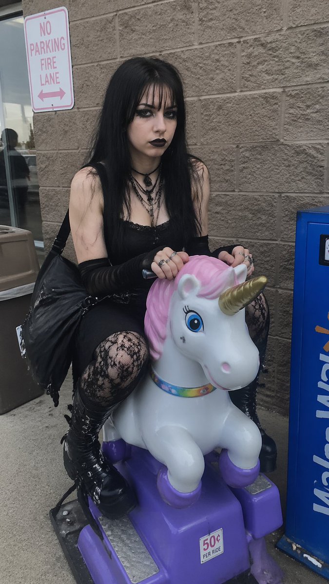 AI Prompt: Realistic Portrait of Goth Girl on Unicorn Ride
