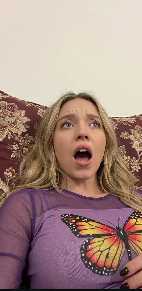 AI Prompt for Face Consistency: Shocked Expression Portrait with Low Angle