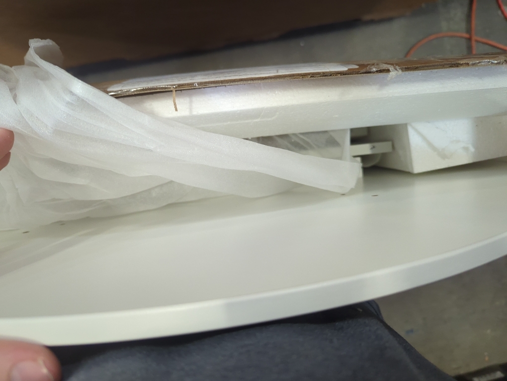 Size Large Color White round table with black flower print on top