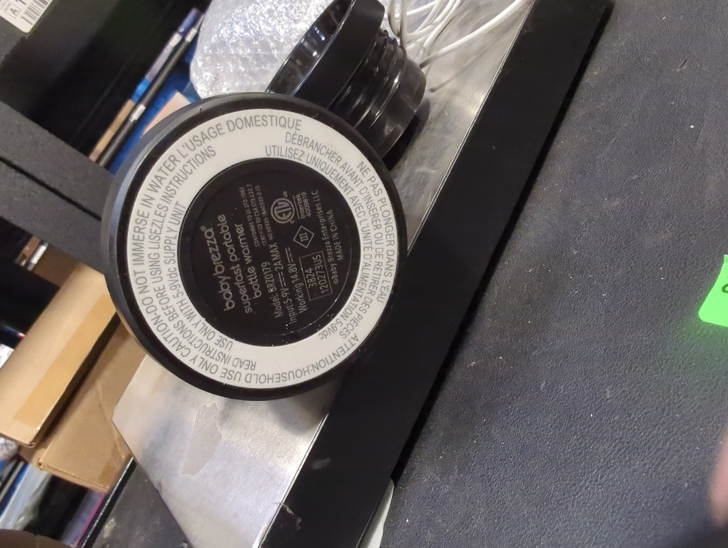 Baby Brezza Portable Warmer – 3X Faster Baby Bottle Warming - Travel Breastmilk and Formula Warmer - Safe, Even Heating - Up to 9oz - No Adapters, Black