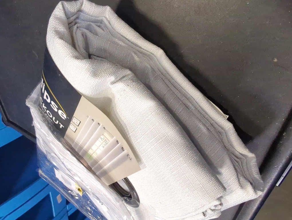 Cohen Thermaback White Textured Solid Polyester 42 in. W x 63 in. L Blackout Single Grommet Top Curtain Panel