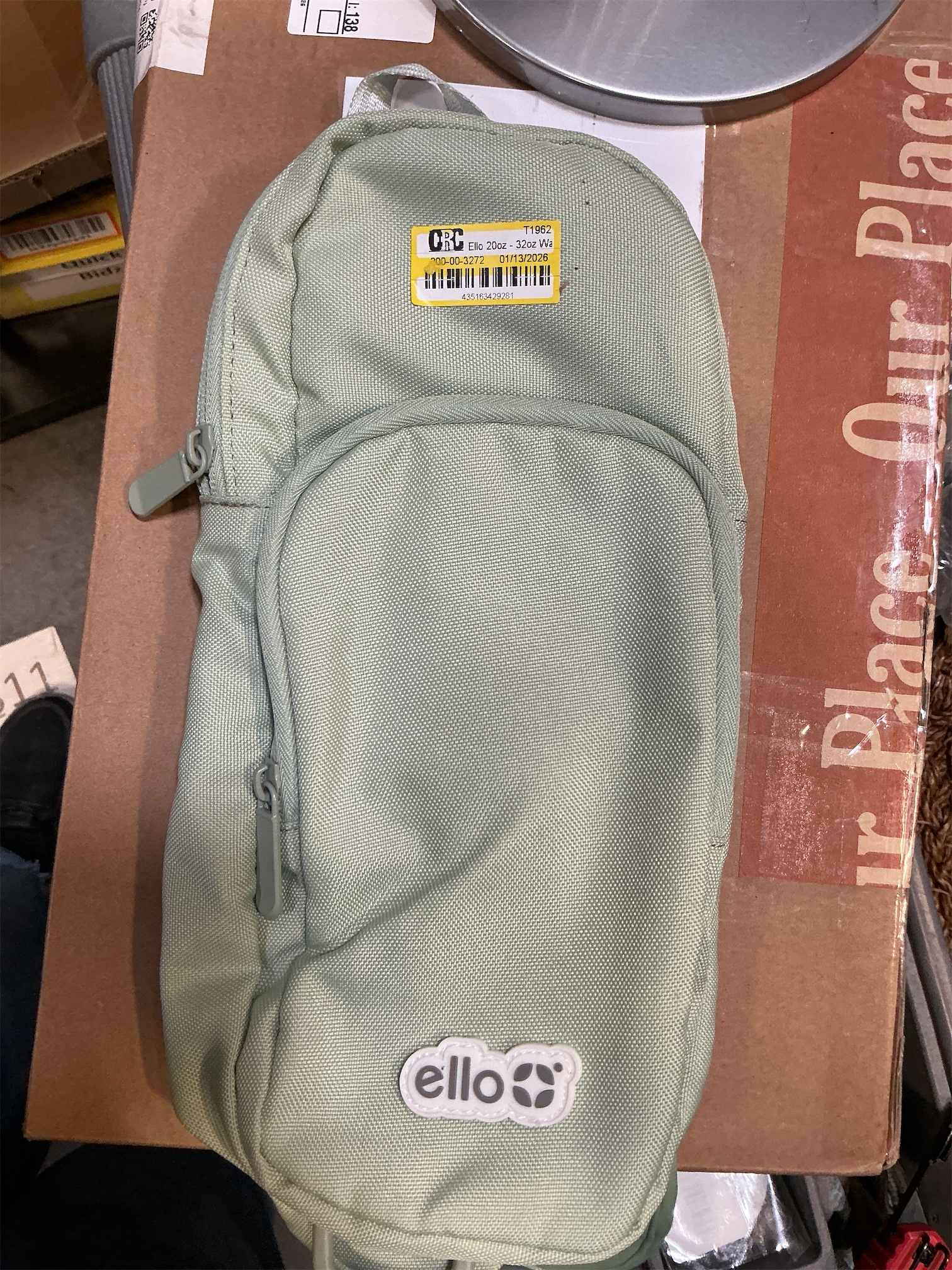 Ello Crossbody Sling Water Bottle Bag | Fits 24oz Bottles Zipped | Hands-Free Carrier with Pockets, Adjustable Strap, Drawstring Fastener | Machine Washable