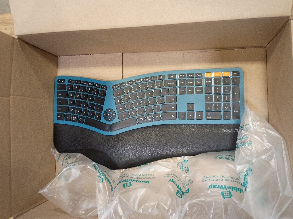 ProtoArc EK01 Plus Backlit Bluetooth Ergonomic Keyboard, Full Size, Blue | Adjustable brightness, split design, cushioned wrist rest, connect 3 devices via Bluetooth/2.4G, 2000mAh USB-C rechargeable.