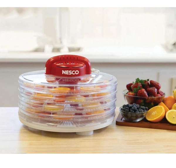 The NESCO Fixed Temperature Dehydrator with 4 BPA-free clear trays offers an efficient and straightforward food dehydration experience. Ideal for both beginners and seasoned food preservationists, this dehydrator features a detachable top-mounted powerhea