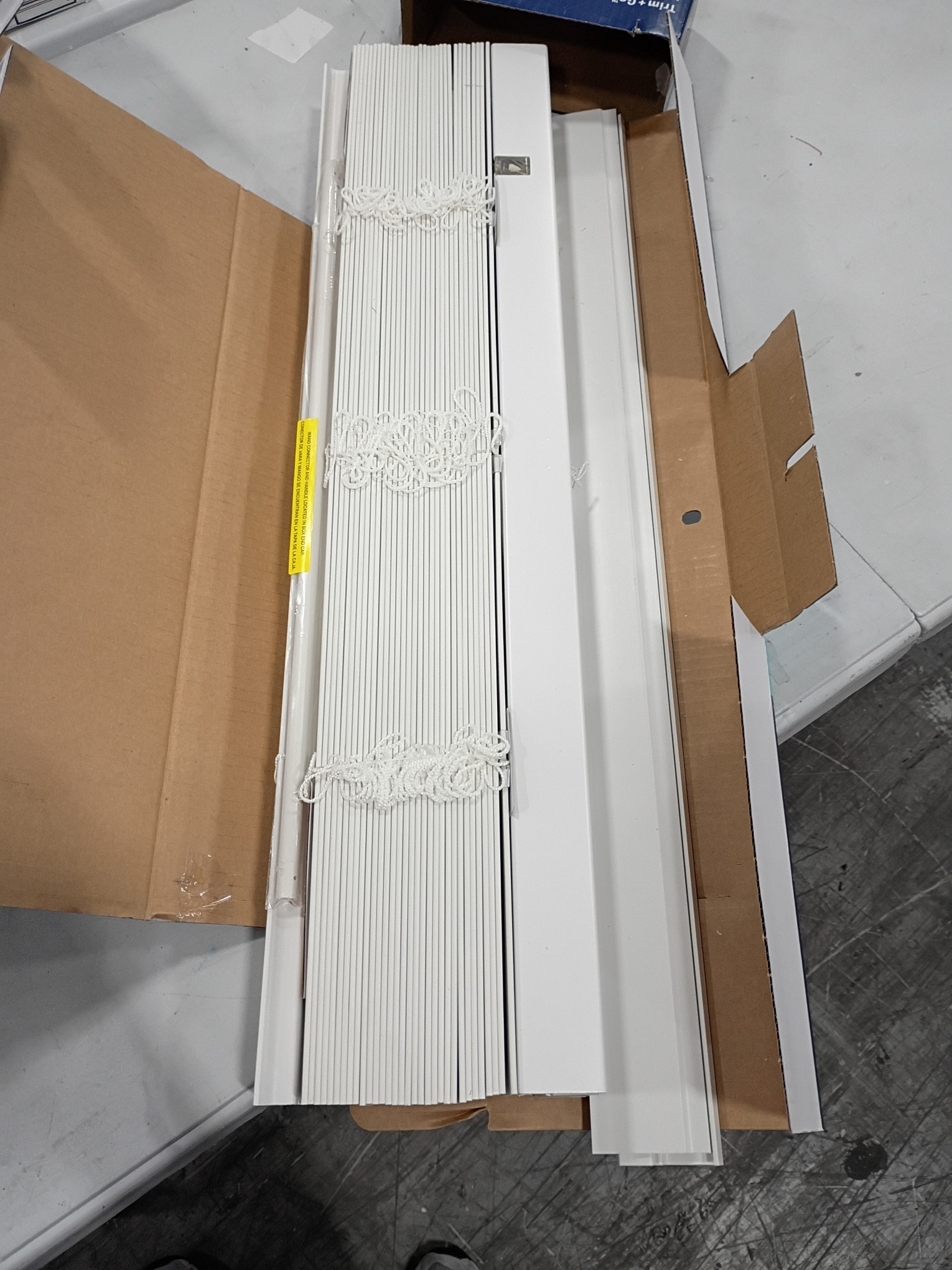 LEVOLOR Trim Go 2.5-in Slat Width 27-in x 72-in Cordless White Faux Wood Room Darkening Full-view Standard Horizontal Blinds