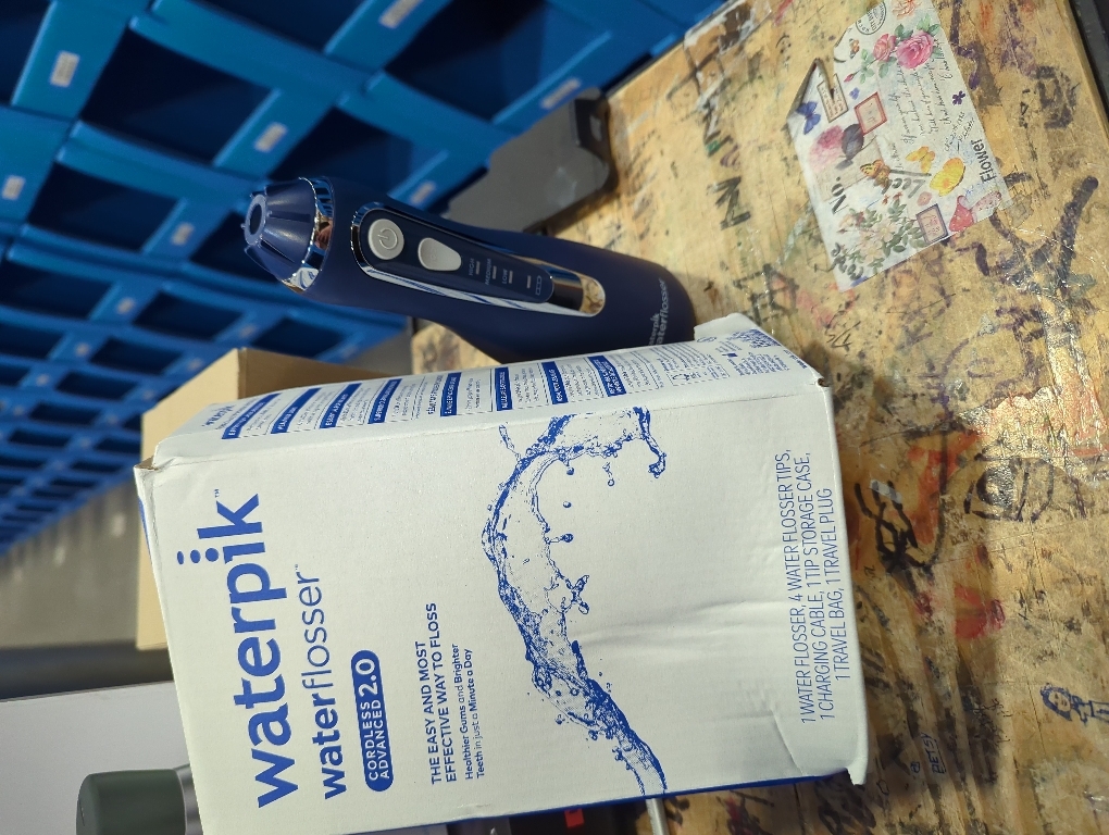 Waterpik Cordless Advanced 2.0 Water Flosser For Teeth, Gums, Braces, Dental Care With Travel Bag and 4 Tips, ADA Accepted, Rechargeable, Portable, and Waterproof, Blue WP-583, Packaging May Vary