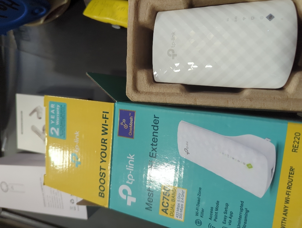 TP-Link Network RE200 AC750 WiFi Range Extender Dual Band 750Mbps with 802.11b/g/n Retail