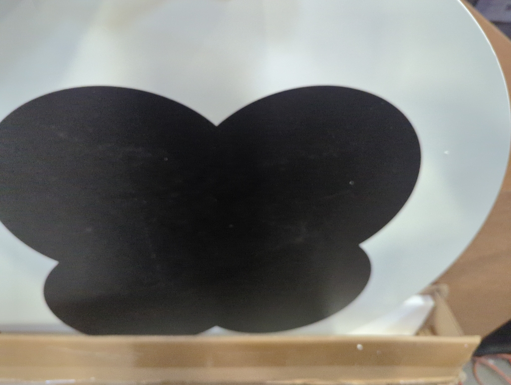 Size Large Color White round table with black flower print on top