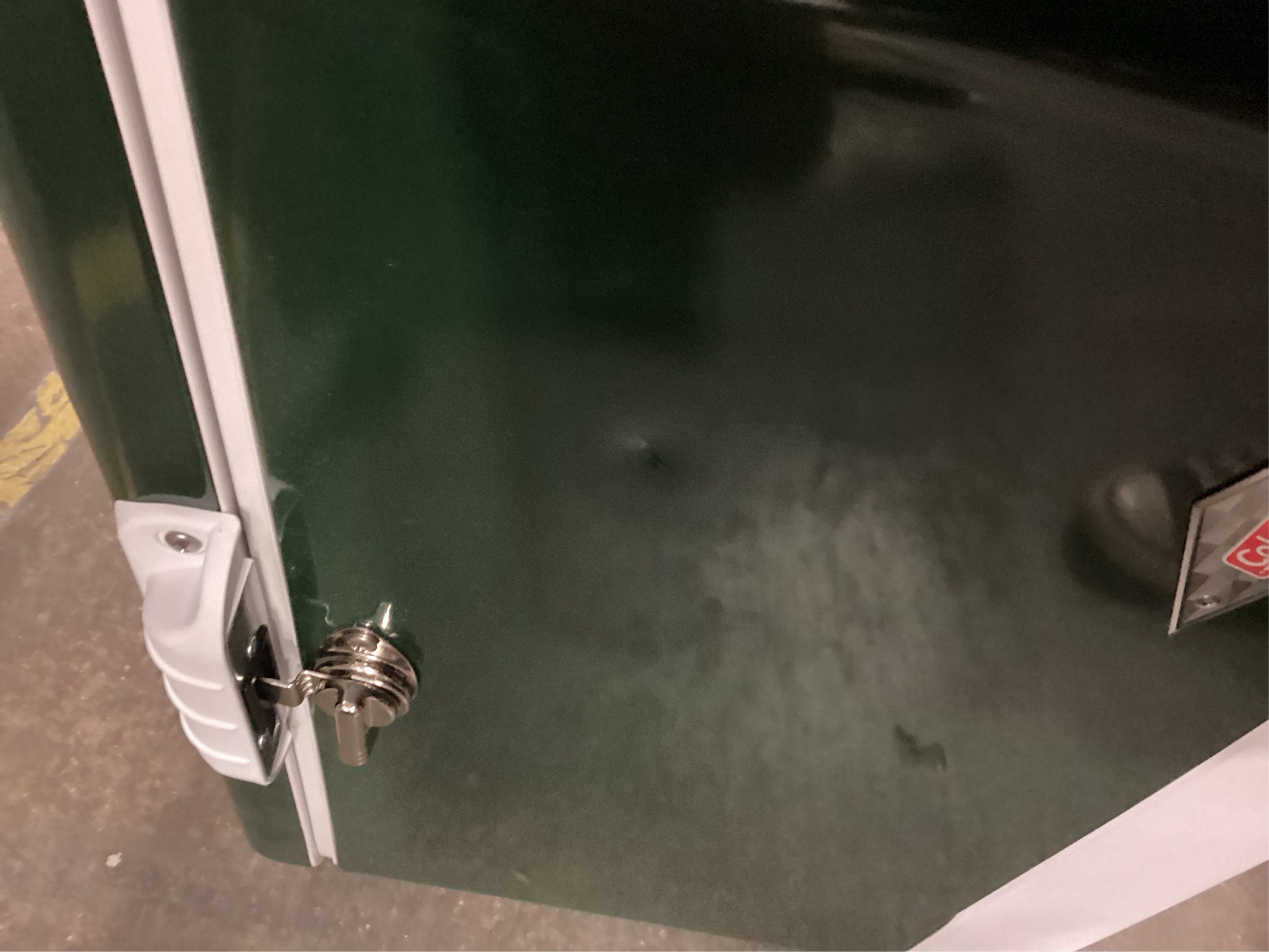 Coleman Vintage 54qt Steel Belted Cooler, Keeps Ice Up to 4 Days, 85-Can Capacity Hard Cooler with Drain & Have-A-Seat Lid has a few dents on lid and front