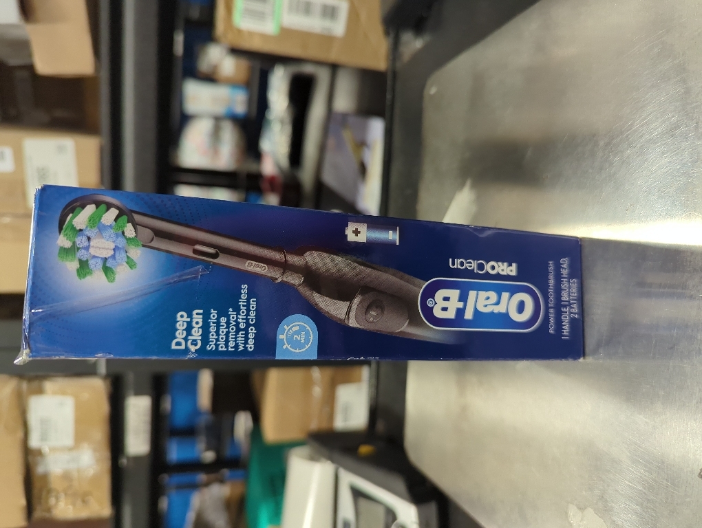 Oral-B Pro 100 CrossAction, Battery Powered Toothbrush, Black, 1 Count (Pack of 1)