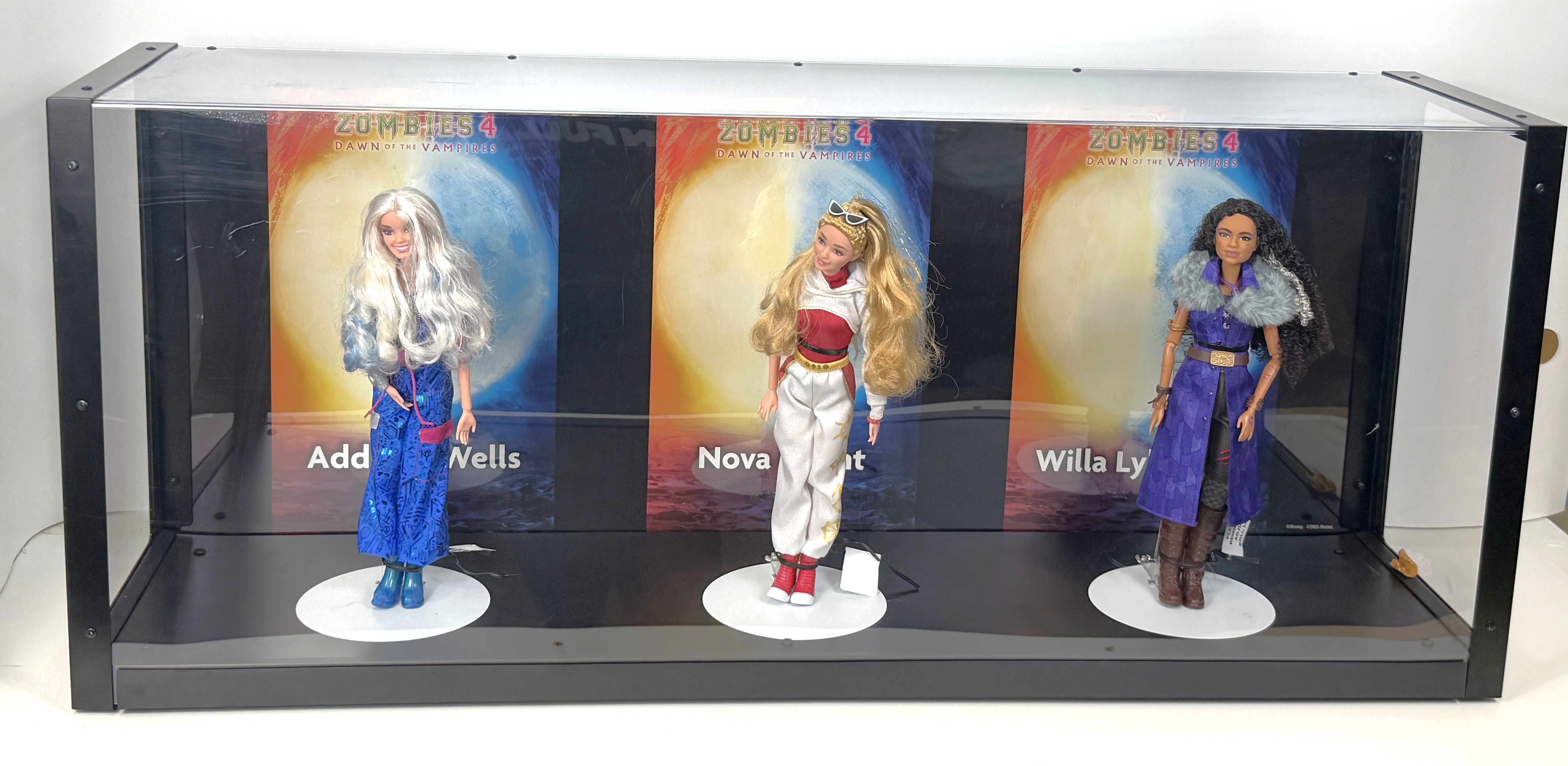 Zombies 4 dolls Addison ,nova and willa with display case