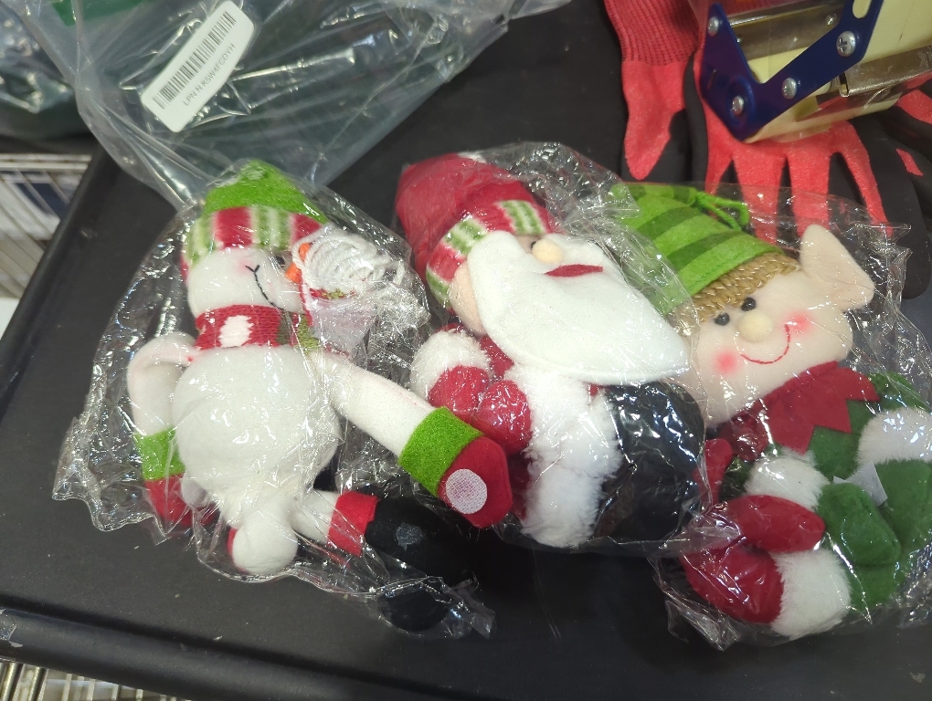 Santa elf and frosty stuffed dolls