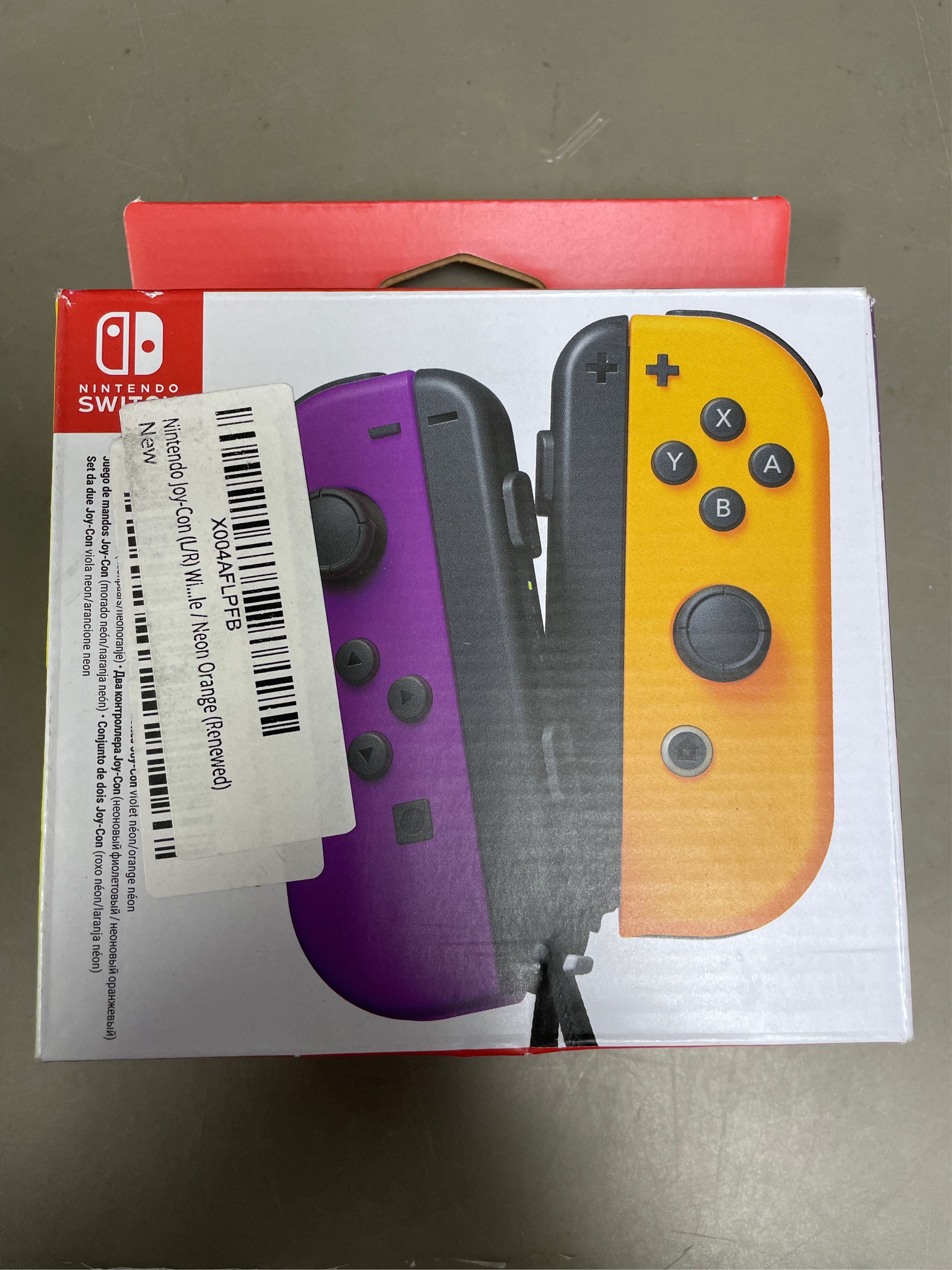 Nintendo Switch Joy-Con Pair, Neon Purple and Neon Orange