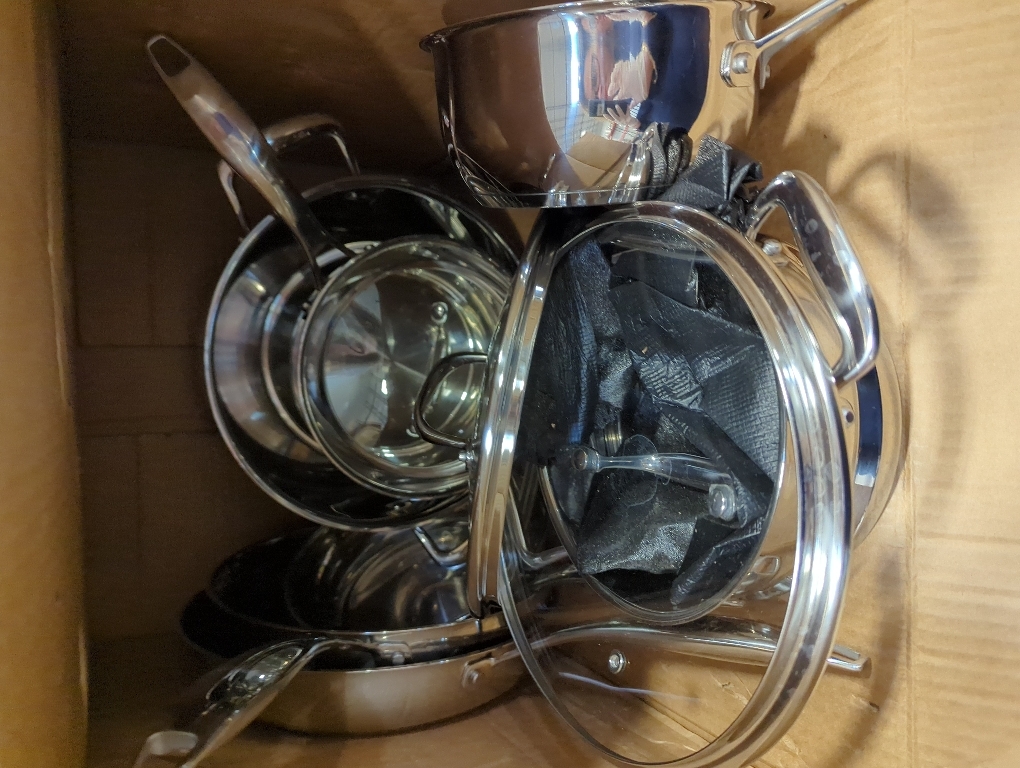 Amazon Basics Stainless Steel Cookware 11-Piece Set, Oven Safe, Pots and Pans, Induction-Ready, Even Heating, Easy to Clean, Heavy Duty, Silver