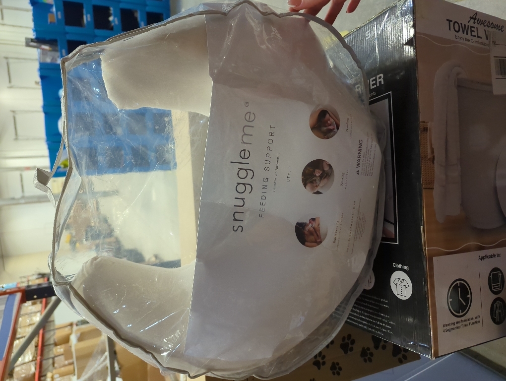 Nursing pillow with a 100% cotton satin cover. Firm maternity pillow for breastfeeding and support. Multi-purpose comfort during pregnancy and postpartum. Boomerang design by Nordic Sleep.