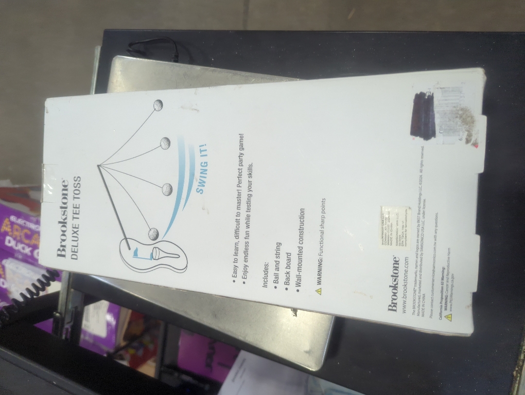 Brookstone Deluxe Tee Toss