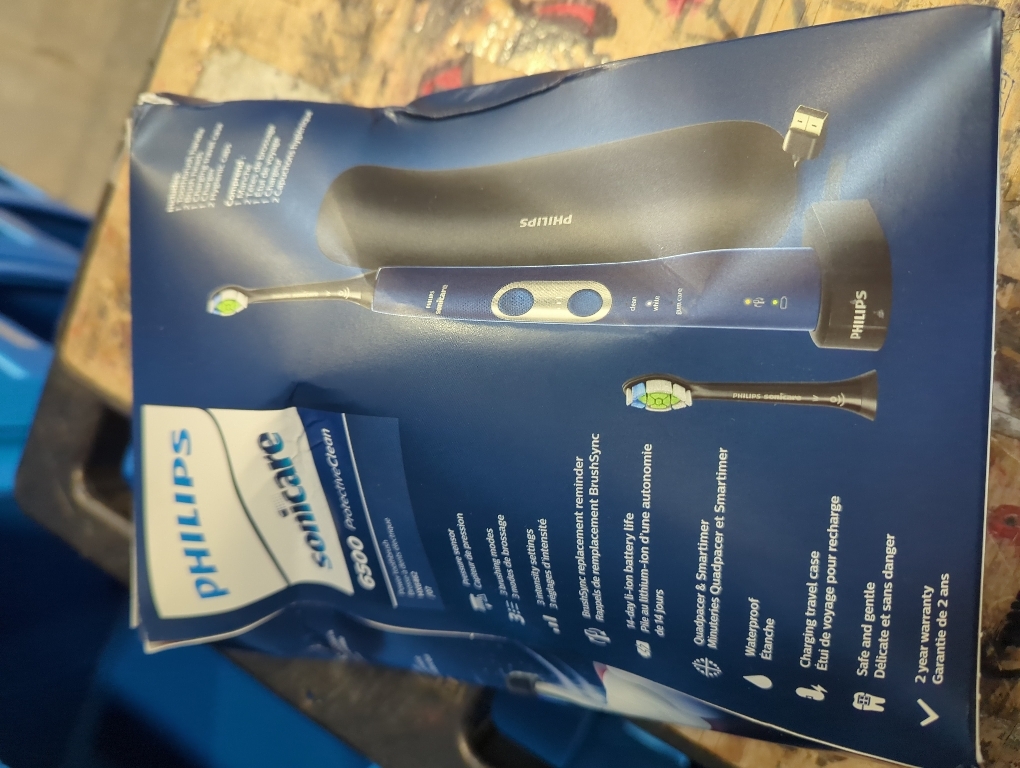 Philips Sonicare ProtectiveClean 6500 Rechargeable Electric Toothbrush, with Pressure Sensor, 3 Cleaning Modes, SmarTimer and QuadPacer, 14-Day Battery Life, Charging Travel Case, Navy Blue, HX6462/07