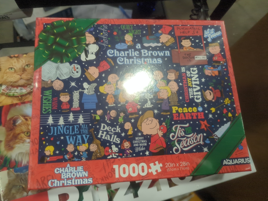 AQUARIUS Peanuts Charlie Brown Wrapping Paper 1000pc Puzzle (1000 Piece Jigsaw Puzzle) - Glare Free - Precision Fit - Officially Licensed Peanuts Merchandise & Collectibles -22x28 Inches