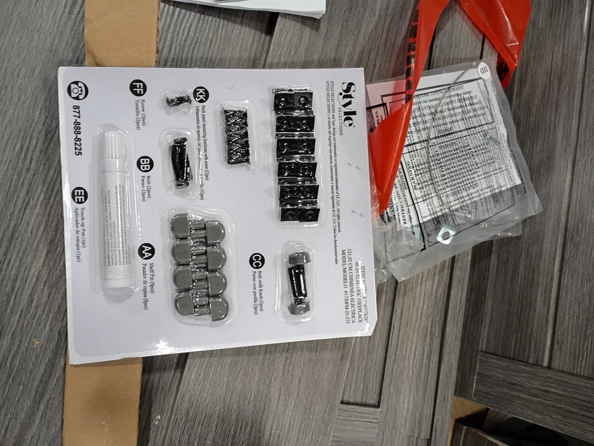 Style Selections 48-in W Iron Oak Infrared Quartz Electric Fireplace (littles damaged; see the pictures)