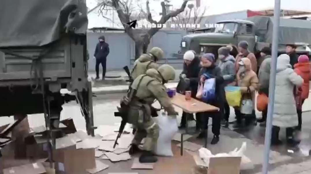 Ukraine - Russian Army distributes food to residents
