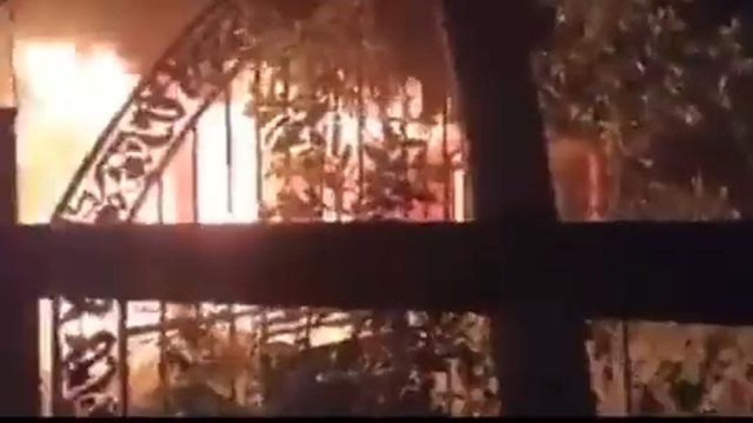 ⁣Ancestral home of #Rajapaksas set on fire by anti-government protesters