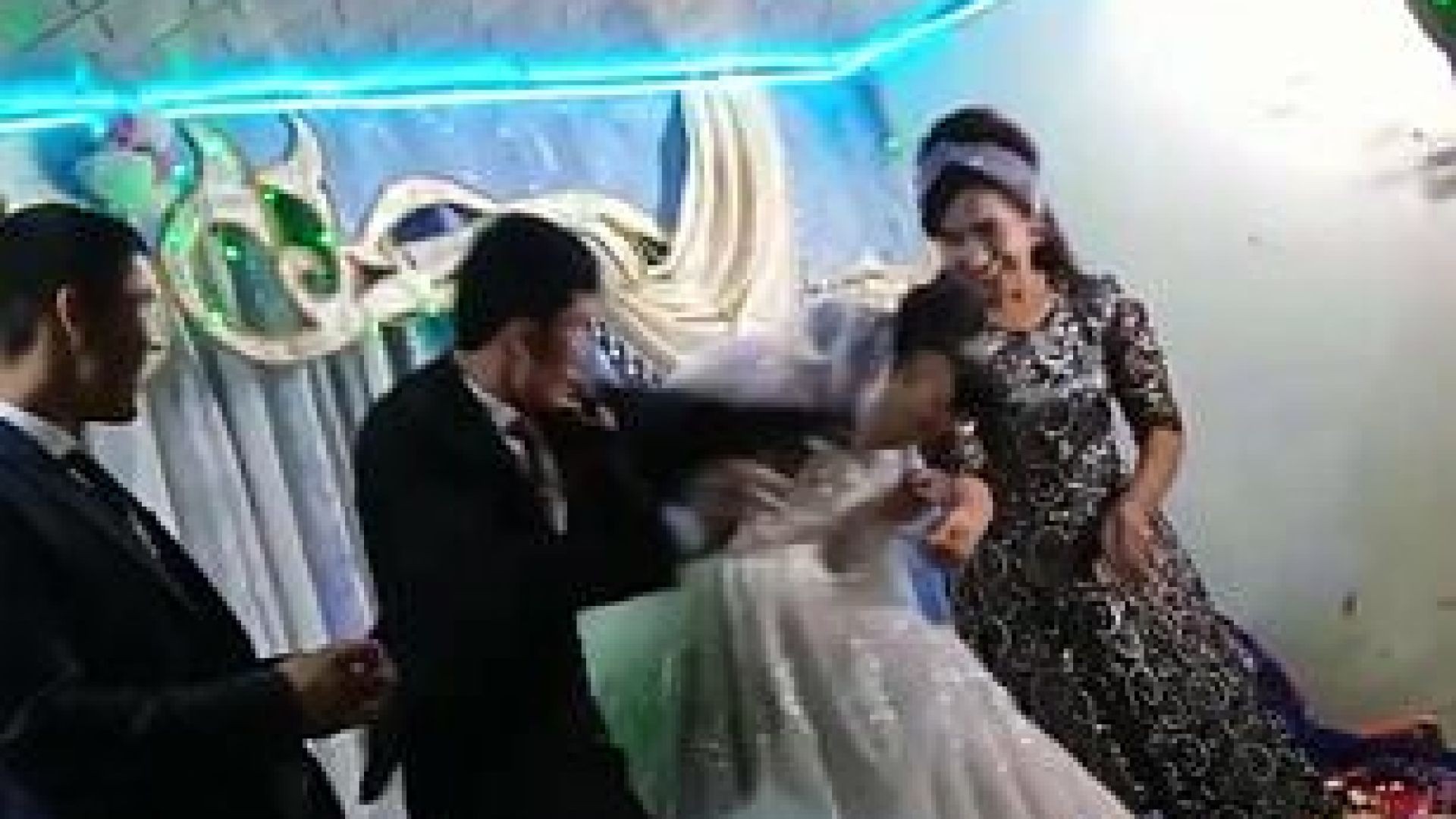 Horrifying moment groom beats his new wife at their WEDDING