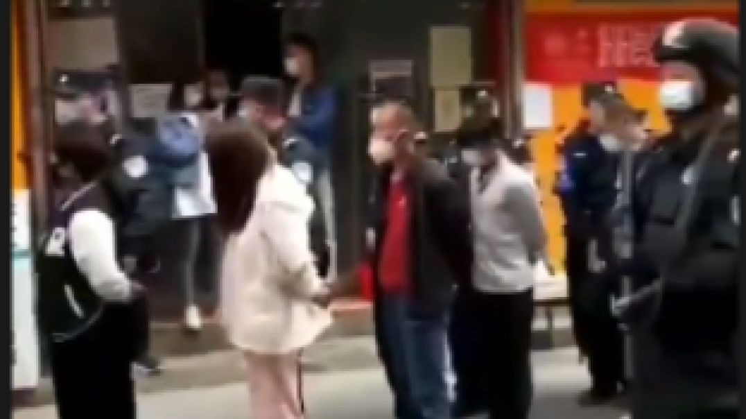 CHINA - These Citizens Are Handcuffed And Lined Up To Forcibly Take Covid Tests By Armed Police!