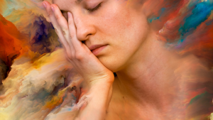 An image of a woman with her hand on her face, captured during a soulful adventure.