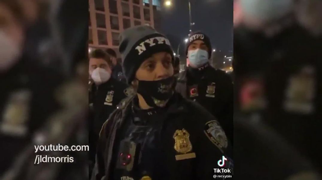 NYPD Sergeant Dana M. Martillo wearing Trump MAGA badges at Brooklyn Protests