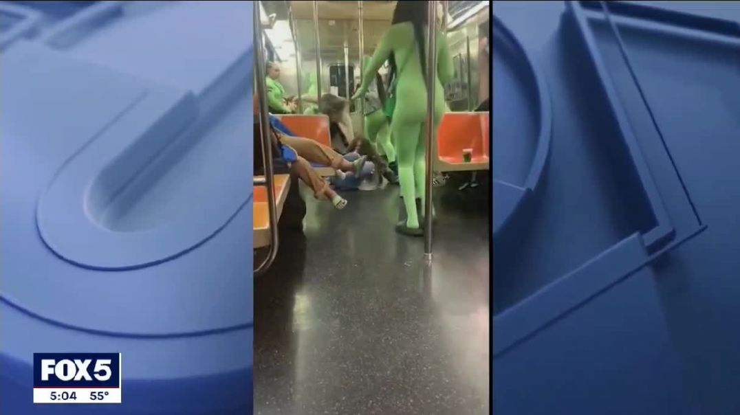 Group of 'aliens' in neon bodysuits Assault Teens on NYC Subway Train
