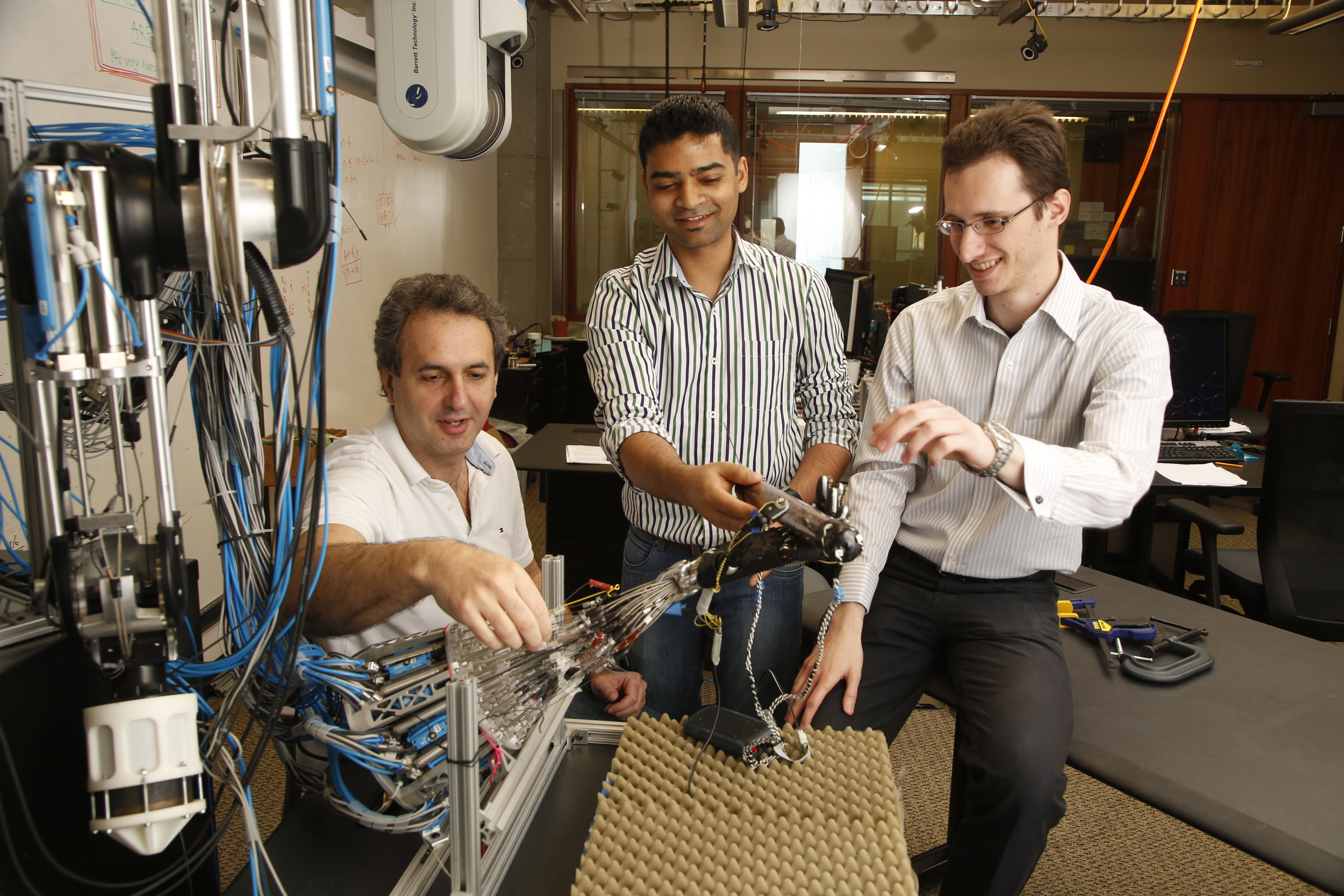 This five-fingered robot hand learns to get a grip on its own