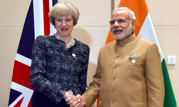 Theresa May rejects calls to relax Indian visa rules