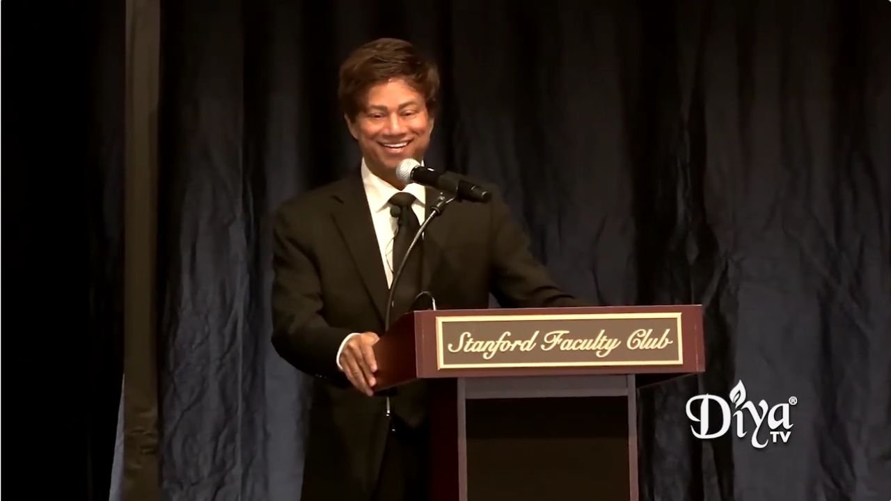 Thanedar at a podium
