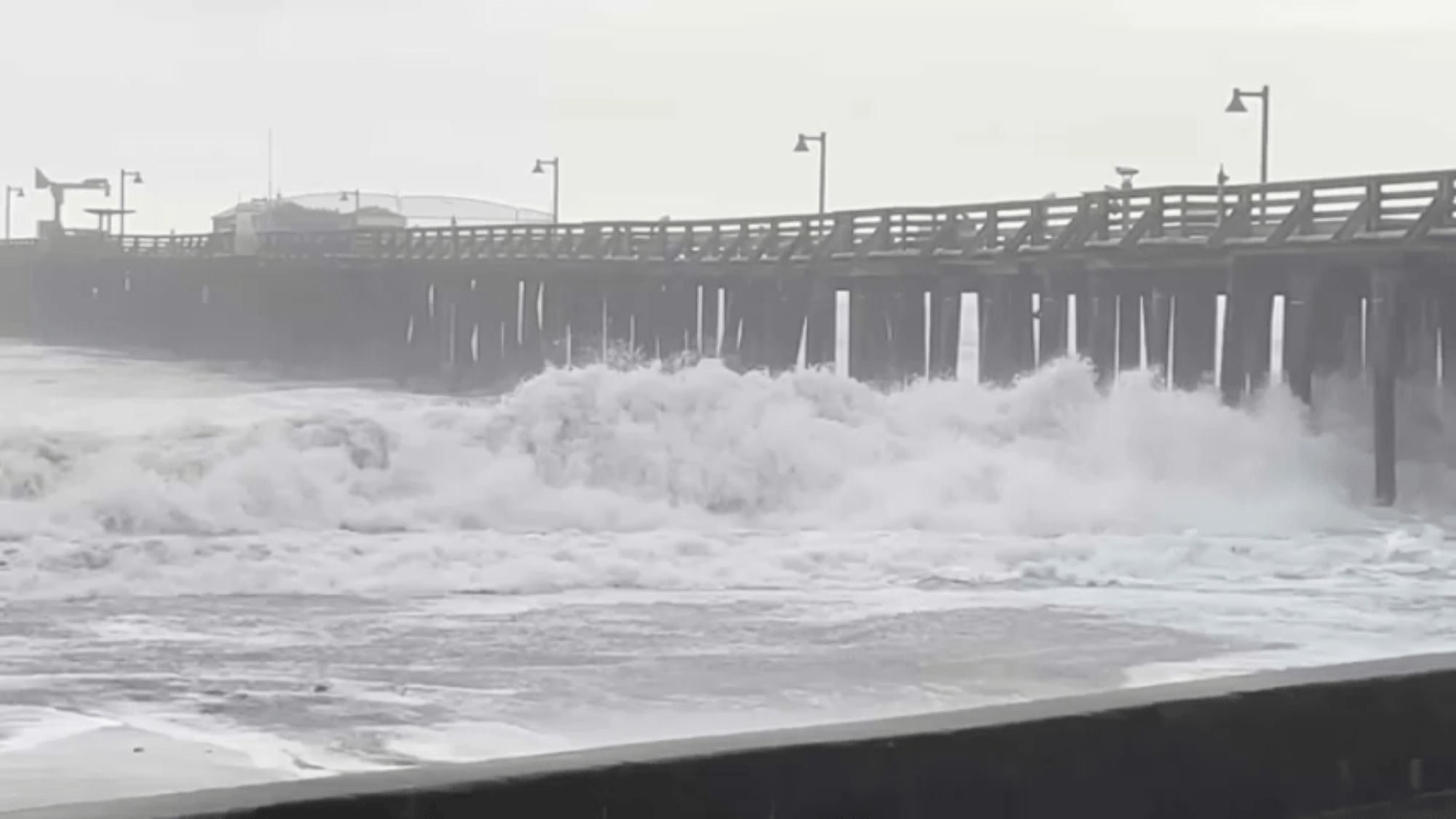 Man killed by wave, another missing as storm batters Santa Cruz coast & damages historic pier