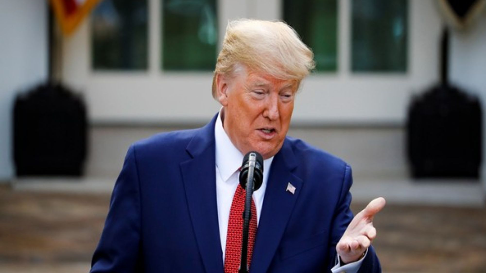 Trump warns of 100% tariffs on Russian oil buyers