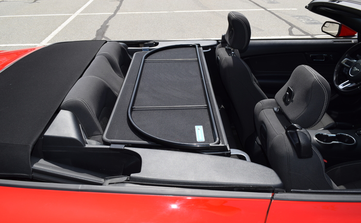 Mustang convertible wind deflector fits 2015 to 2023 photo of wind deflector folded down designed by love the drive