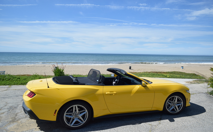 Mustang convertible wind deflector fits 2024 to 2030 at the beach in la 2 manufacturered by love the drive